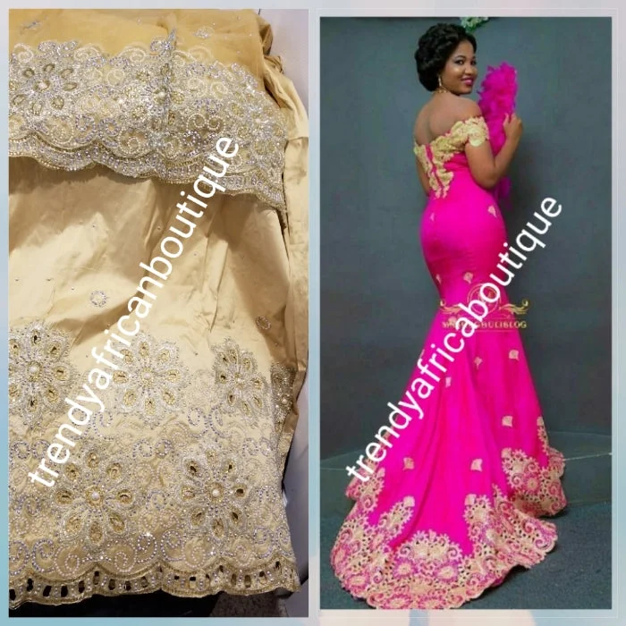 Sale: New arrival Nigerian Tranditional wedding George wrapper. Embellished with quality dazzling beads/crystal stones. Classic Gold. Full 5yds + 1.8yds matching blouse + free headtie. Indian-George made with original taffeta silk Office Formal Blouse Sale: New arrival Nigerian Tranditional wedding George wrapper. Embellished with quality dazzling beads/crystal stones. Classic Gold. Full 5yds + 1.8yds matching blouse + free headtie. Indian-George made with original taffeta silk Office Formal Blouse
