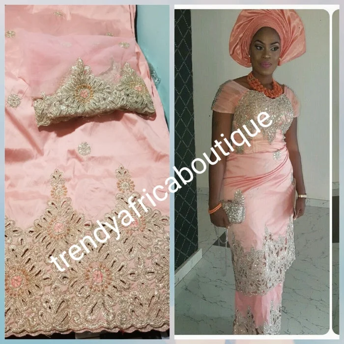 Original quality sweet peach with gold embriodery and beaded silk George wrapper. Nigerian traditional wedding George, Quality Indian-George. 5yds wrapper + 1.8yds net matching blouse. Aso-ebi available. Contact us for detail. Cotton Casual Blouse Original quality sweet peach with gold embriodery and beaded silk George wrapper. Nigerian traditional wedding George, Quality Indian-George. 5yds wrapper + 1.8yds net matching blouse. Aso-ebi available. Contact us for detail. Cotton Casual Blouse