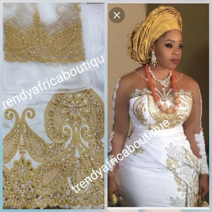 Original quality White/gold embriodery and beaded silk George wrapper. Nigerian traditional wedding George, Quality Indian-George. 5yds wrapper + 1.8yds net matching blouse. Aso-ebi available. Contact us for detail. Floral Chiffon Blouse Original quality White/gold embriodery and beaded silk George wrapper. Nigerian traditional wedding George, Quality Indian-George. 5yds wrapper + 1.8yds net matching blouse. Aso-ebi available. Contact us for detail. Floral Chiffon Blouse