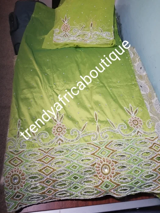 Sale: Quality Lemon Green Taffeta Silk George wrapper: hand cut border beaded and silver crystal stoned for Nigerian traditional wedding/party outfit. Come as 2.5yds+2.5yds +1.8yds matching net for blouse. best Indian-george. Double-Layered Blouse Sale: Quality Lemon Green Taffeta Silk George wrapper: hand cut border beaded and silver crystal stoned for Nigerian traditional wedding/party outfit. Come as 2.5yds+2.5yds +1.8yds matching net for blouse. best Indian-george. Double-Layered Blouse
