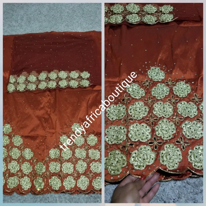 New arrival Burnt Orange/gold quality Silk George wrapper. Gold embriodery + all over crystal stone work. Classic design Niger/delta/igbo George design for Nigerian wedding and more. 5yds + 1.8yrds matching Blouse. Indian-george Soft Pastel Blouse New arrival Burnt Orange/gold quality Silk George wrapper. Gold embriodery + all over crystal stone work. Classic design Niger/delta/igbo George design for Nigerian wedding and more. 5yds + 1.8yrds matching Blouse. Indian-george Soft Pastel Blouse