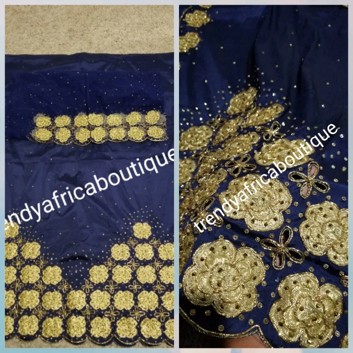 New arrival Navy/gold quality Silk George wrapper. Gold embriodery + all over crystal stone work. Classic design Niger/delta/igbo George design for Nigerian wedding and more. 5yds + 1.8yrds matching Blouse. Indian-george Feminine Satin Blouse New arrival Navy/gold quality Silk George wrapper. Gold embriodery + all over crystal stone work. Classic design Niger/delta/igbo George design for Nigerian wedding and more. 5yds + 1.8yrds matching Blouse. Indian-george Feminine Satin Blouse