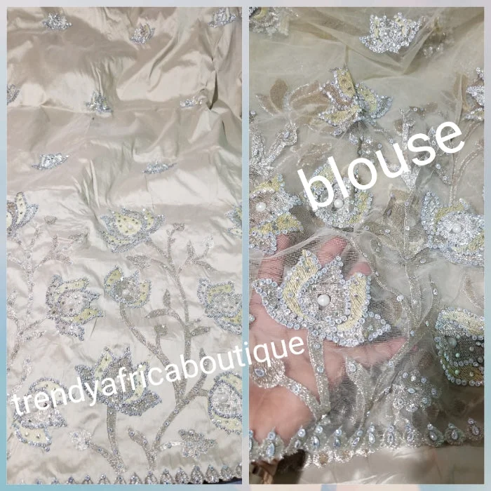 New arrival: Nigerian Traditional Silk embroidery George wrapper. Quality embroidery + Hand Beaded/stones design in Cream color 5yds + 1.8 matching net blouse. Igbo/delta bride outfit. Small-George. Embroidered Floral Blouse New arrival: Nigerian Traditional Silk embroidery George wrapper. Quality embroidery + Hand Beaded/stones design in Cream color 5yds + 1.8 matching net blouse. Igbo/delta bride outfit. Small-George. Embroidered Floral Blouse