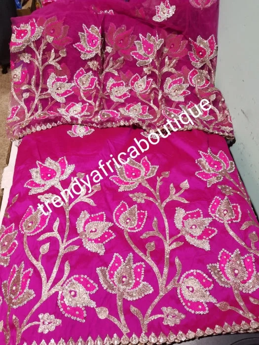 New arrival: Nigerian Traditional Silk embroidery George wrapper. Quality embroidery + Hand Beaded/stones design in hot pink 5yds + 1.8 matching net blouse. Igbo/delta bride outfit. Small-George. Chic Off-Shoulder Blouse New arrival: Nigerian Traditional Silk embroidery George wrapper. Quality embroidery + Hand Beaded/stones design in hot pink 5yds + 1.8 matching net blouse. Igbo/delta bride outfit. Small-George. Chic Off-Shoulder Blouse