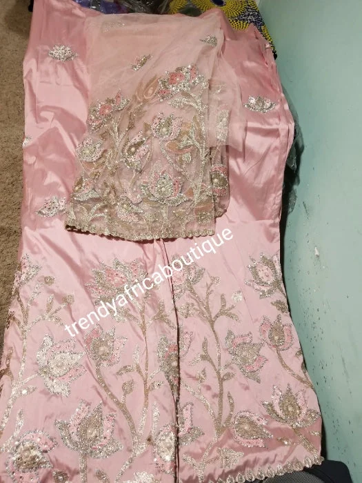 Sweet dusty pink Nigerian Traditional Silk embroidery George wrapper. Quality embroidery + Hand Beaded/stones design in beautiful soft pink color 5yds + 1.8 matching net blouse. Igbo/delta bride outfit. Small-George. Puff Sleeve Blouse Sweet dusty pink Nigerian Traditional Silk embroidery George wrapper. Quality embroidery + Hand Beaded/stones design in beautiful soft pink color 5yds + 1.8 matching net blouse. Igbo/delta bride outfit. Small-George. Puff Sleeve Blouse