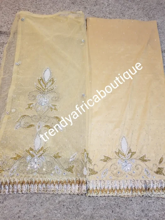 Latest skin taffeta George, champagne Gold beaded & stoned 2.5yds + stoned Net wrapper + 2.5yds + 1.8yds matching net blouse. Sold as a set and price is for the set. Indian-George Sheer Sleeve Blouse Latest skin taffeta George, champagne Gold beaded & stoned 2.5yds + stoned Net wrapper + 2.5yds + 1.8yds matching net blouse. Sold as a set and price is for the set. Indian-George Sheer Sleeve Blouse