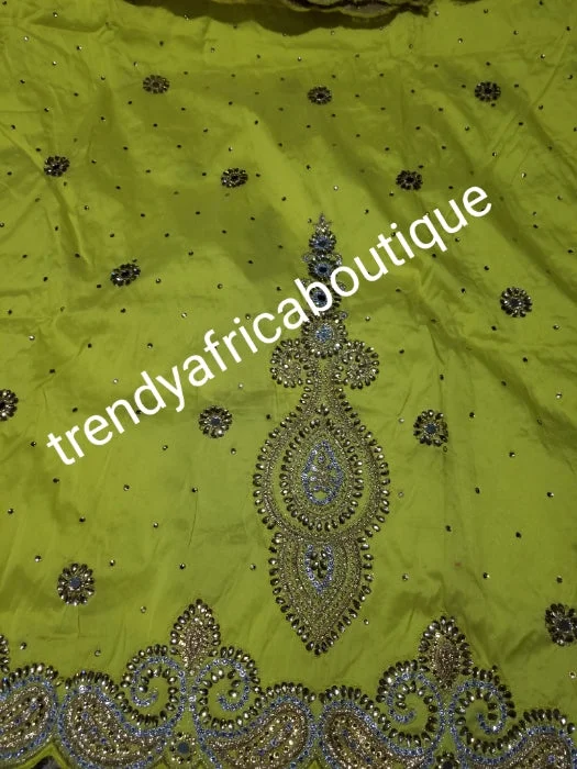 SALE,SALE- New arrival Nigerian Tranditional wedding George wrapper. Embellished with quality dazzling beads/crystal stones design in rich yellow. Full 5yds + 1.8yds matching blouse. Indian-George. Chic Ruffle Blouse SALE,SALE- New arrival Nigerian Tranditional wedding George wrapper. Embellished with quality dazzling beads/crystal stones design in rich yellow. Full 5yds + 1.8yds matching blouse. Indian-George. Chic Ruffle Blouse
