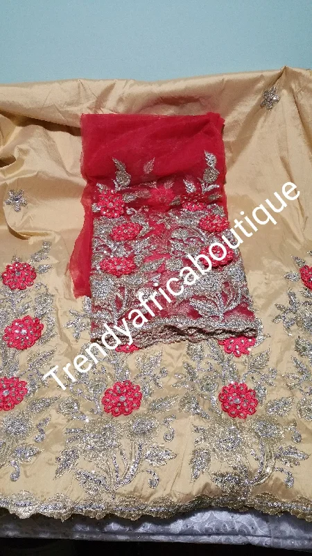 Nigerian Tranditional George wrapper. Embriodery/stones design in Champagne/coral red matching blouse. Small-George. Puff Sleeve Blouse Nigerian Tranditional George wrapper. Embriodery/stones design in Champagne/coral red matching blouse. Small-George. Puff Sleeve Blouse
