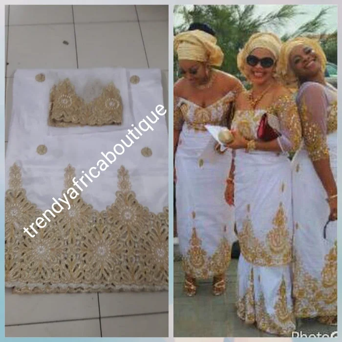 SALE: Original quality White/gold embriodery and beaded silk George wrapper. Nigerian traditional wedding George, Quality Indian-George. 5yds wrapper + 1.8yds net matching blouse. Aso-ebi available. Contact us for detail. Modern Work Blouse