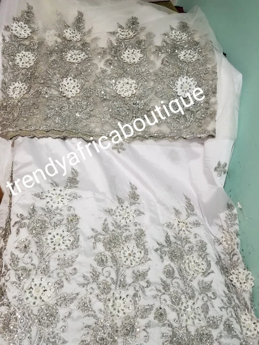Quality pure White/White Taffeta Silk George wrapper for Nigerian women. 5yds wrapper + 1.8yds matching net for blouse. Sold as a set. Embriodery/beads and stone work. Small-george Office Formal Blouse Quality pure White/White Taffeta Silk George wrapper for Nigerian women. 5yds wrapper + 1.8yds matching net for blouse. Sold as a set. Embriodery/beads and stone work. Small-george Office Formal Blouse